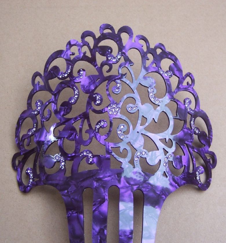   HAIR COMB IN A PRETTY PURPLE INTERLACED PATTERN WITH RHINESTONE TRIM