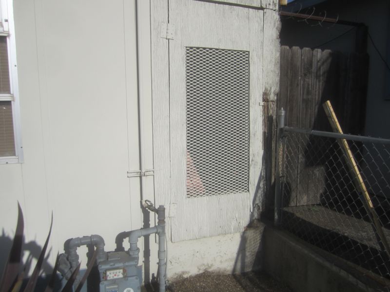 Back side enclosed area entry door