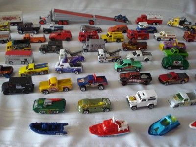 LOT OF 60 HOTWHEEL & OTHER TRUCKS BOATS BRONCO W/ BIKE CAR HAULER BONE 