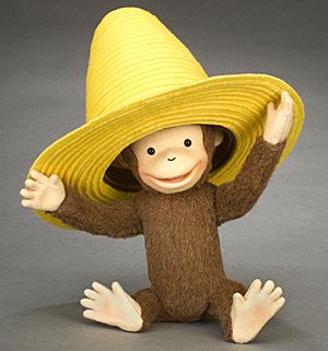 JOHN WRIGHTS CURIOUS GEORGE AND THE YELLOW HAT  