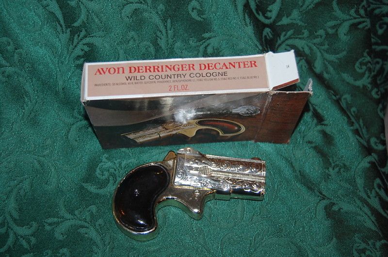 AVON BOTTLE DERRINGER DECANTER WILD COUNTRY  