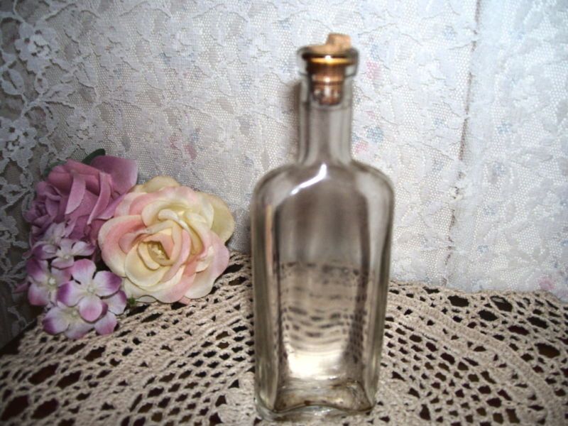 OLD MEDICINE BOTTLE CLEAR GLASS WITH CORK  