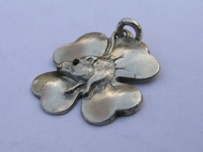   SILVER PIG JUMPING THROUGH CLOVER w RUBY EYE CAB PUFFED CHARM  